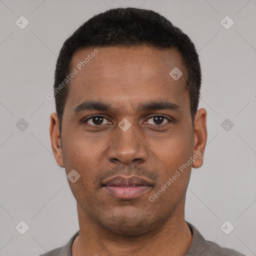 Neutral latino young-adult male with short  black hair and brown eyes