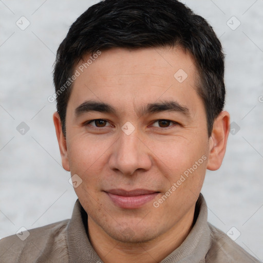 Joyful white adult male with short  brown hair and brown eyes