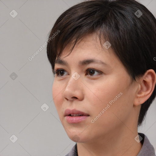 Neutral asian young-adult female with short  brown hair and brown eyes