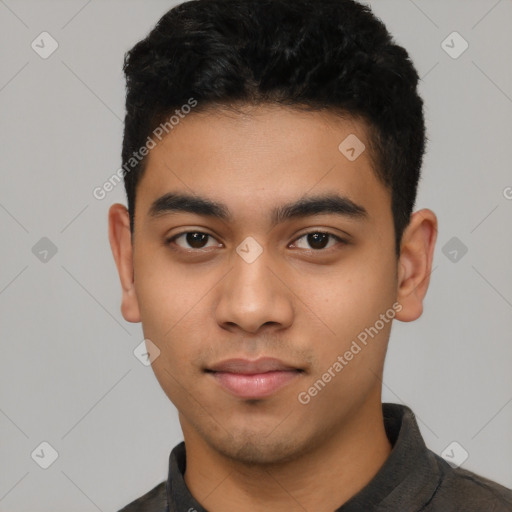 Neutral latino young-adult male with short  black hair and brown eyes