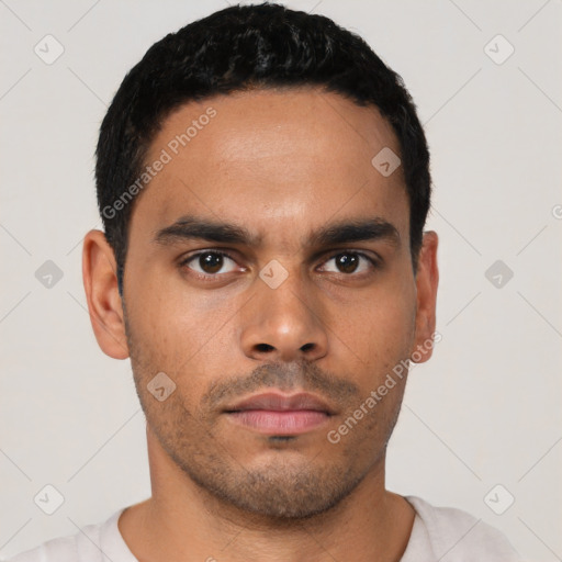 Neutral latino young-adult male with short  black hair and brown eyes