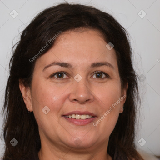 Joyful white adult female with medium  brown hair and brown eyes