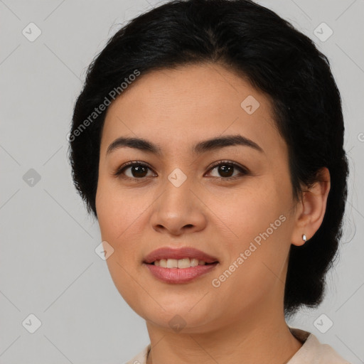 Joyful asian young-adult female with medium  black hair and brown eyes