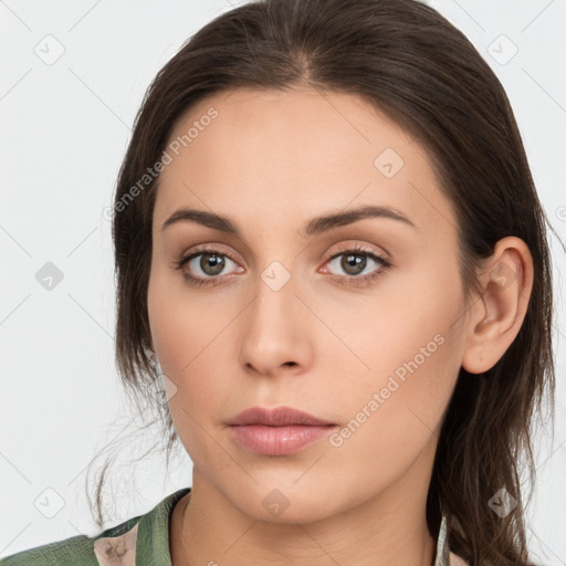 Neutral white young-adult female with medium  brown hair and brown eyes