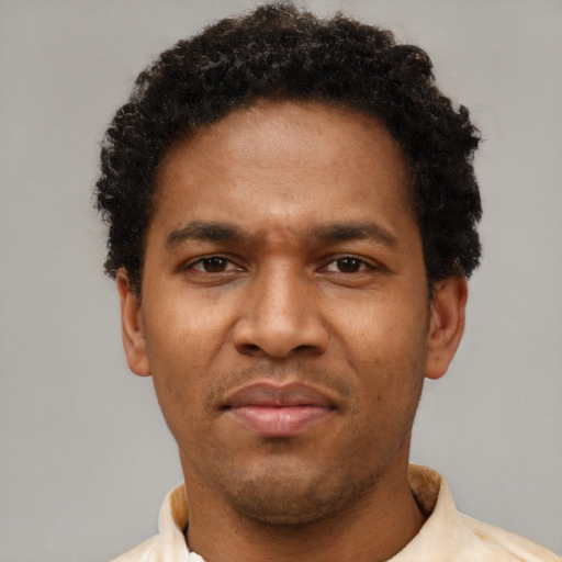 Neutral latino adult male with short  black hair and brown eyes