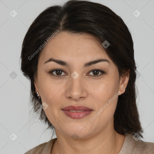 Joyful white adult female with medium  brown hair and brown eyes