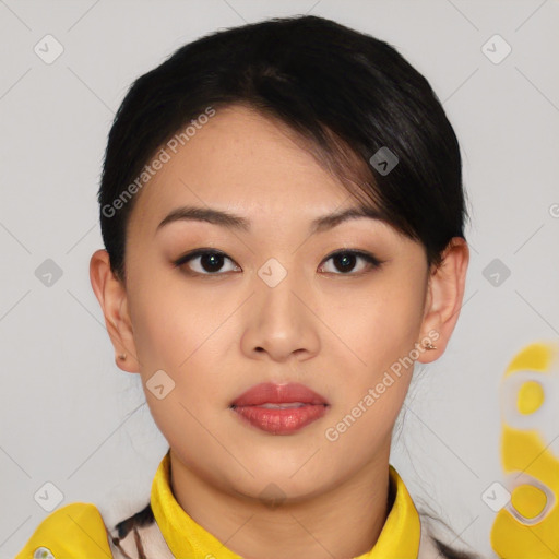 Joyful asian young-adult female with short  brown hair and brown eyes