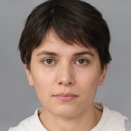 Neutral white young-adult female with short  brown hair and brown eyes