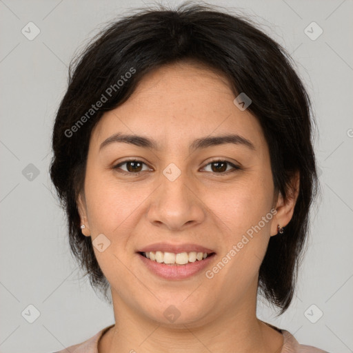 Joyful latino young-adult female with medium  brown hair and brown eyes