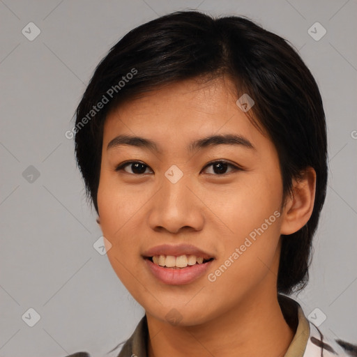 Joyful asian young-adult female with medium  black hair and brown eyes