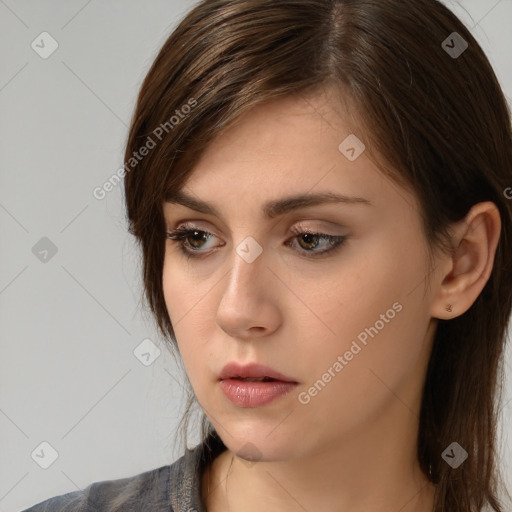 Neutral white young-adult female with medium  brown hair and brown eyes