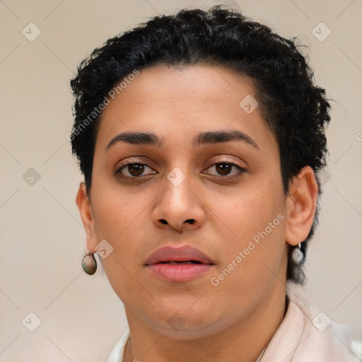 Joyful latino young-adult female with short  brown hair and brown eyes