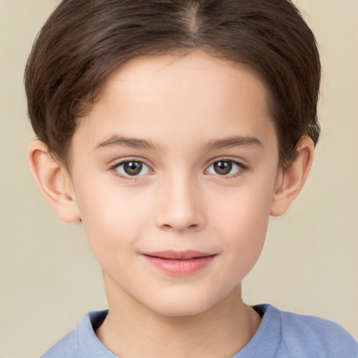 Joyful white child female with short  brown hair and brown eyes