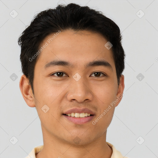 Joyful asian young-adult male with short  brown hair and brown eyes