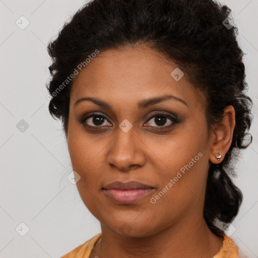 Joyful black young-adult female with long  brown hair and brown eyes