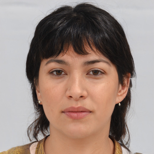 Neutral white young-adult female with medium  brown hair and brown eyes