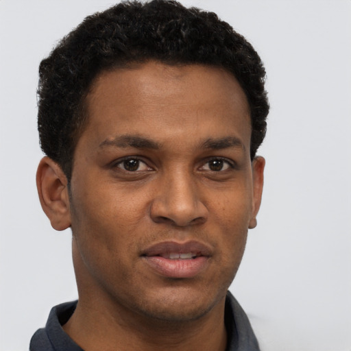 Neutral black young-adult male with short  brown hair and brown eyes