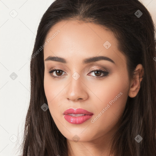 Joyful white young-adult female with long  black hair and brown eyes