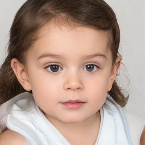 Neutral white child female with medium  brown hair and brown eyes