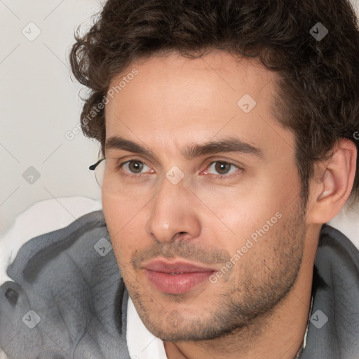 Neutral white adult male with short  brown hair and brown eyes