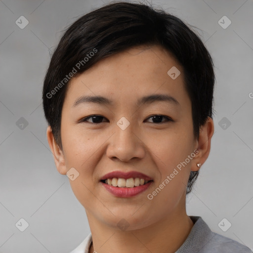 Joyful asian young-adult female with short  black hair and brown eyes