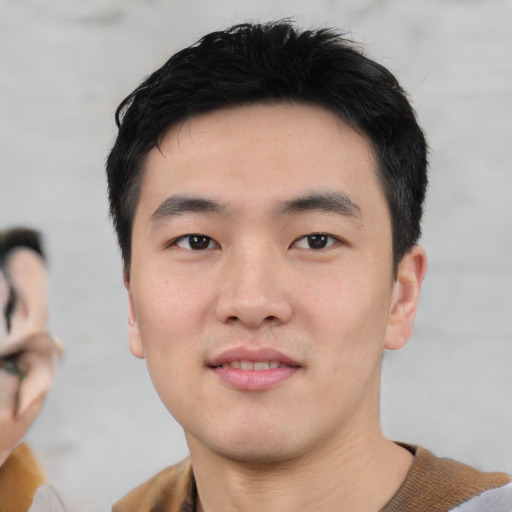 Neutral asian young-adult male with short  black hair and brown eyes
