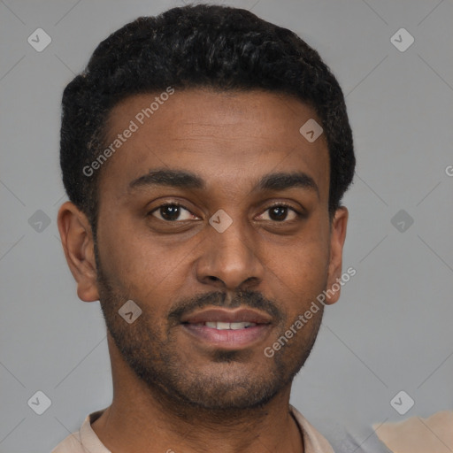 Joyful latino young-adult male with short  brown hair and brown eyes
