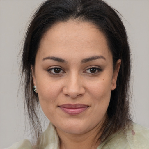 Joyful white young-adult female with medium  brown hair and brown eyes
