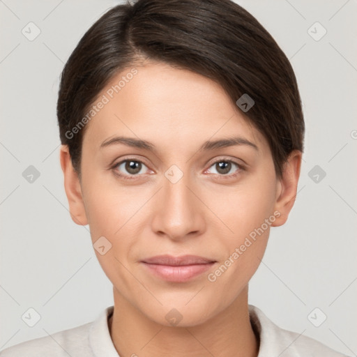 Joyful white young-adult female with short  brown hair and brown eyes