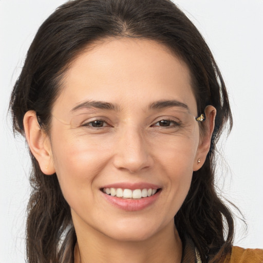 Joyful white young-adult female with medium  brown hair and brown eyes