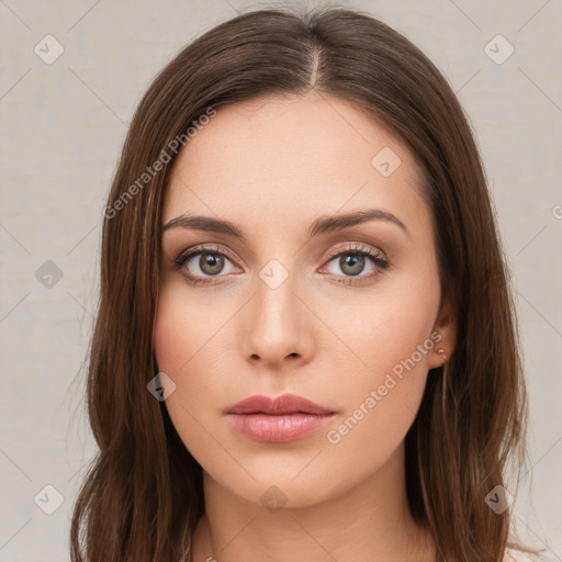 Neutral white young-adult female with long  brown hair and green eyes