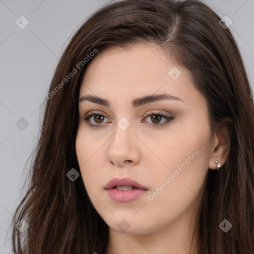 Neutral white young-adult female with long  brown hair and brown eyes