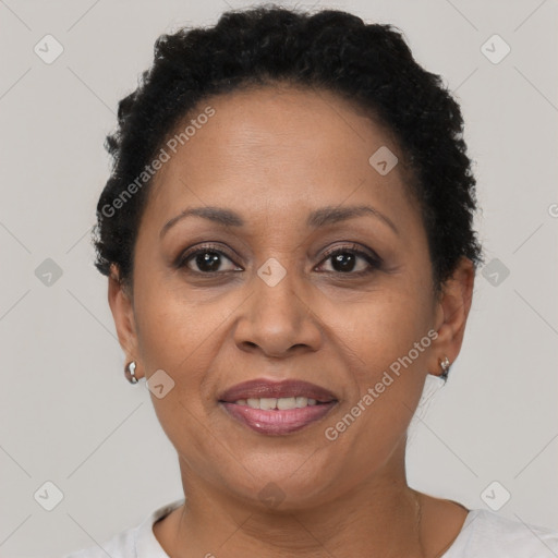 Joyful black adult female with short  brown hair and brown eyes