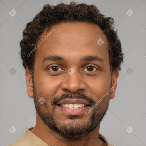 Joyful black young-adult male with short  brown hair and brown eyes