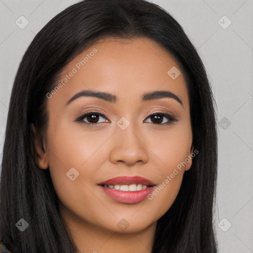 Joyful latino young-adult female with long  brown hair and brown eyes