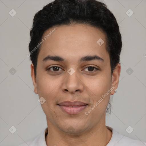 Joyful latino young-adult male with short  black hair and brown eyes