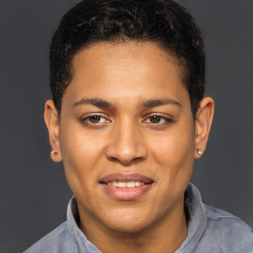 Joyful latino young-adult male with short  brown hair and brown eyes