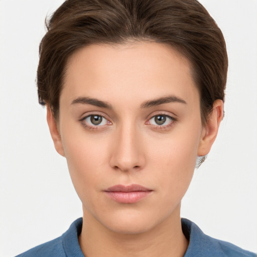 Neutral white young-adult female with short  brown hair and brown eyes