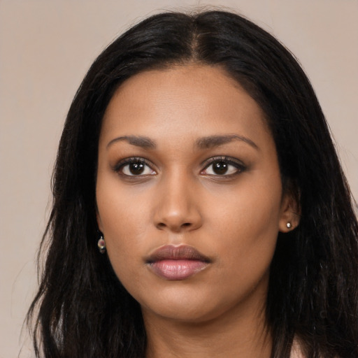 Neutral latino young-adult female with long  black hair and brown eyes