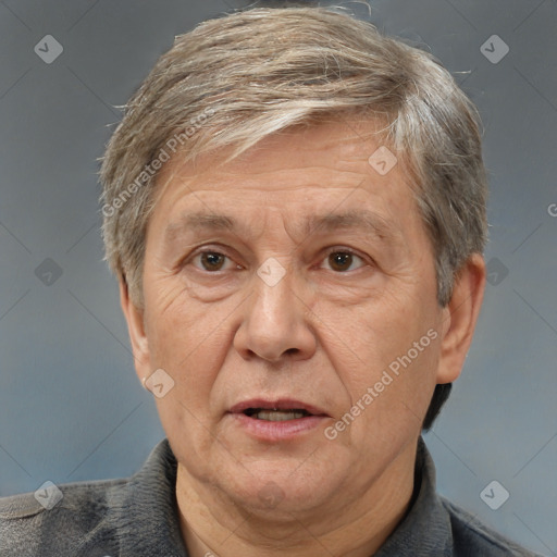 Joyful white middle-aged male with short  brown hair and brown eyes