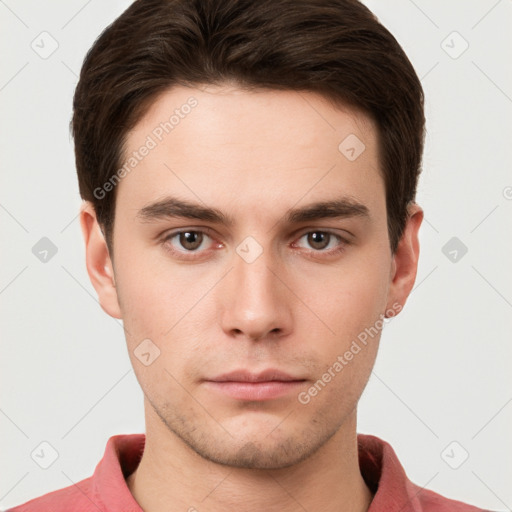 Neutral white young-adult male with short  brown hair and grey eyes