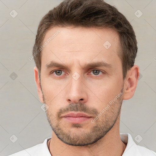 Neutral white young-adult male with short  brown hair and brown eyes