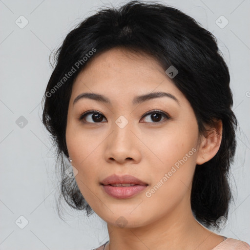 Joyful asian young-adult female with medium  black hair and brown eyes