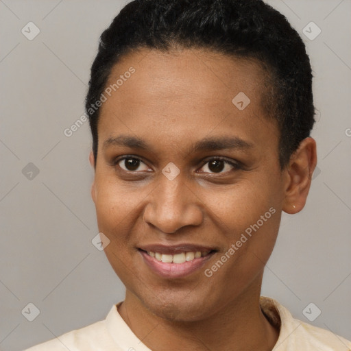 Joyful black young-adult female with short  brown hair and brown eyes