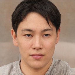 Neutral asian young-adult male with short  brown hair and brown eyes