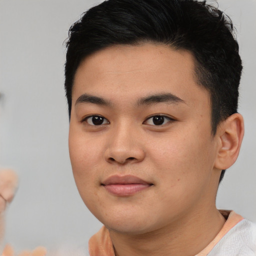 Neutral asian young-adult male with short  black hair and brown eyes