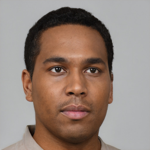 Neutral black young-adult male with short  brown hair and brown eyes