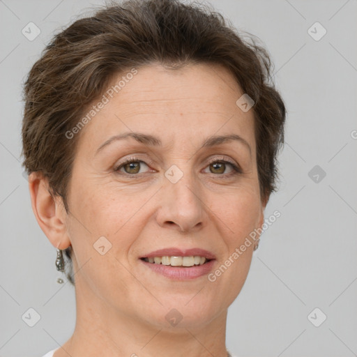 Joyful white adult female with short  brown hair and brown eyes