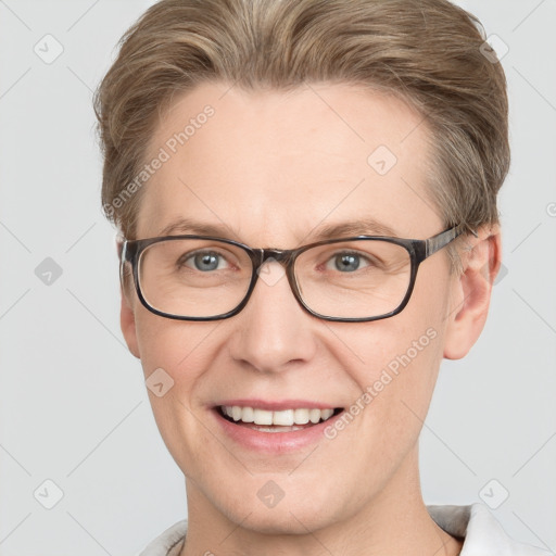 Joyful white adult male with short  brown hair and grey eyes