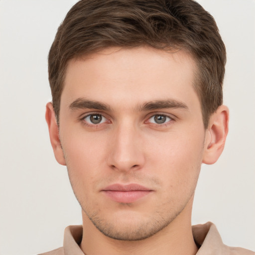 Neutral white young-adult male with short  brown hair and brown eyes